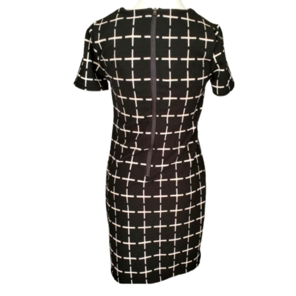 Romeo and Juliet Black and White Cross Cross mini dress. Short Sleeve. Size XS - Picture 2 of 4